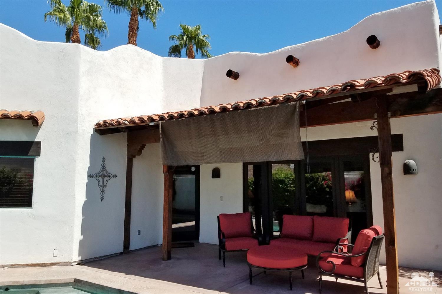52225 Avenida Obregon La Quinta, CA 92253 - Photo 34 of 34 a front view of a house with outdoor seating