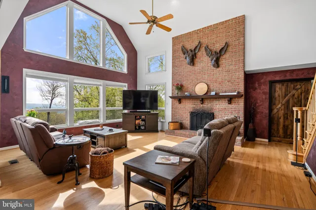 a bathroom with a toilet a sink and a mirror