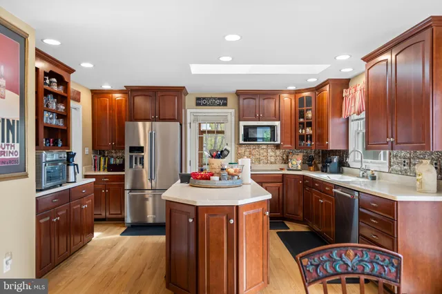 a utility room with a sink a washer and dryer