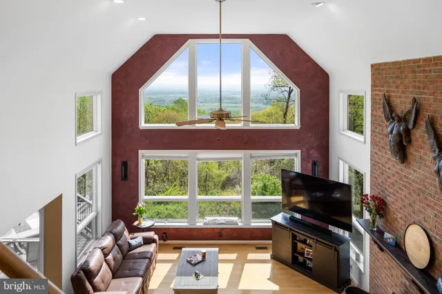 a kitchen with stainless steel appliances a sink dishwasher and cabinets