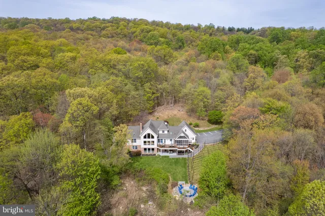 a front view of house with outdoor seating
