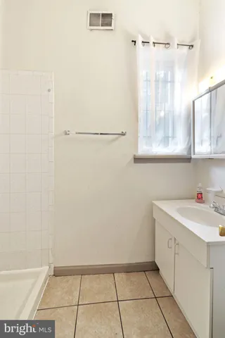 a bathroom with a bath tub