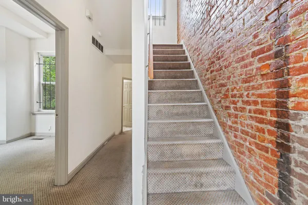 a view of an entryway with staircase