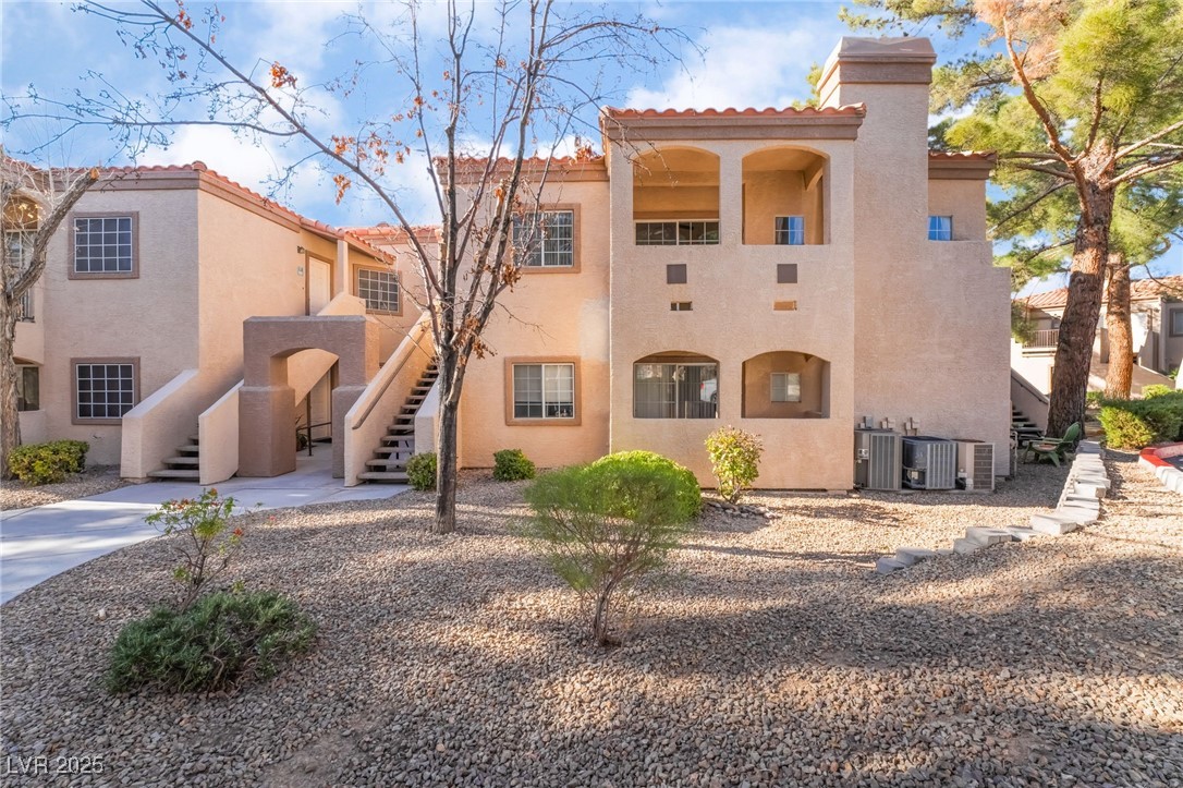 1851 Hillpointe Road, Unit 2912 Henderson, NV 89074 - Photo 2 of 28 View of property featuring central AC and stairway