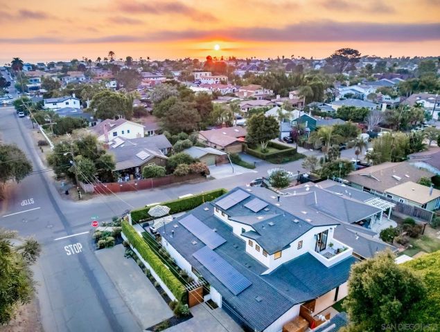 an aerial view of a city with lots of residential buildings