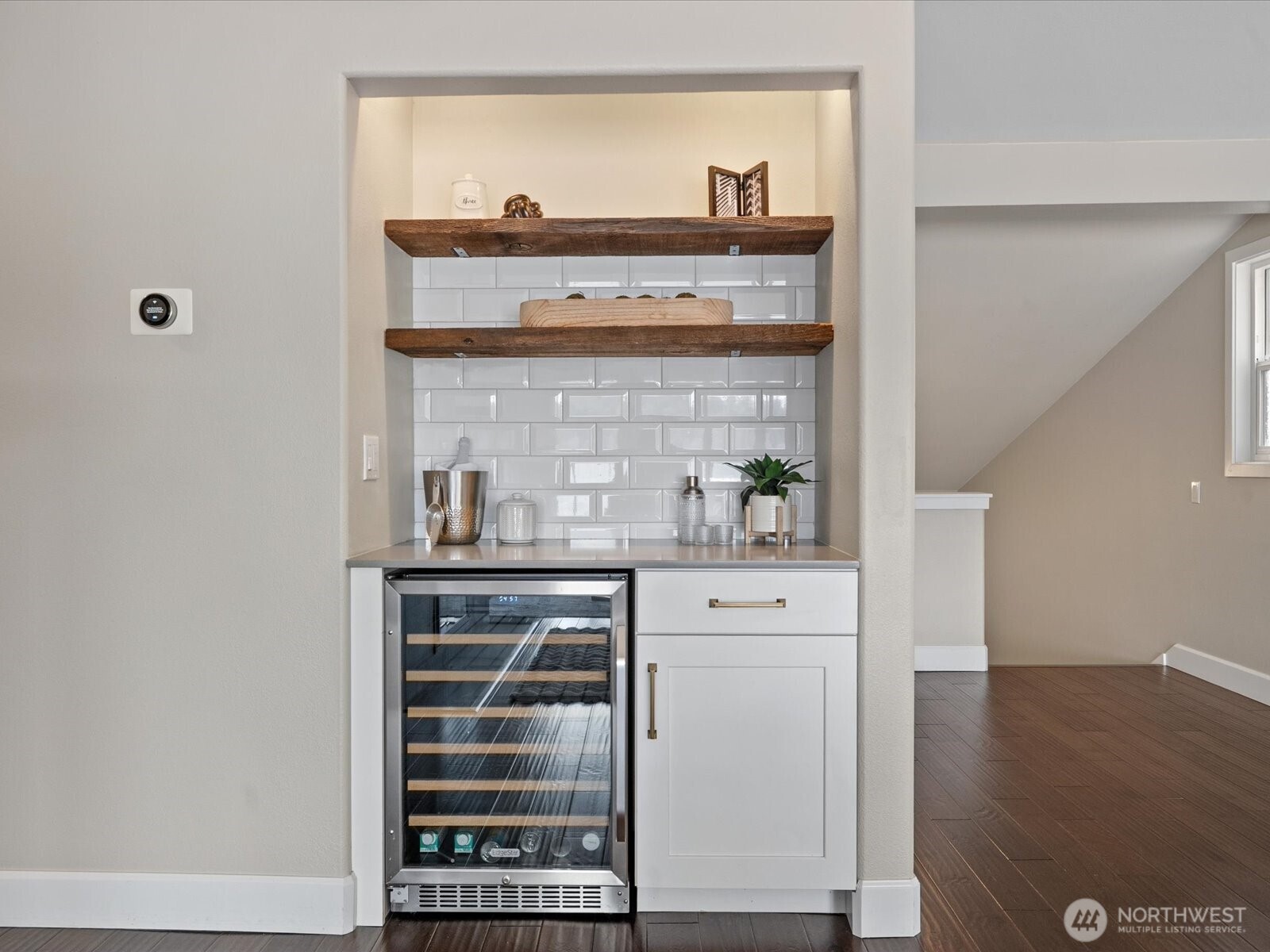 17412 Northeast 40th Place, Unit A6 Redmond, WA 98052 - Photo 17 of 40 a kitchen with a stove and cabinets
