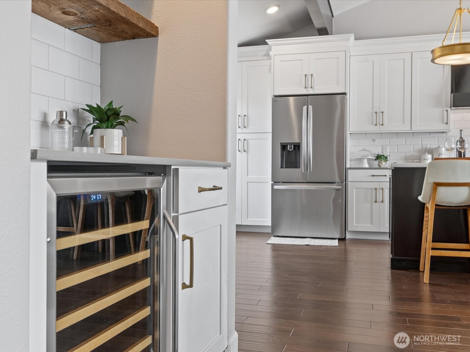 17412 Northeast 40th Place, Unit A6 Redmond, WA 98052 - Photo 18 of 40 a kitchen with a refrigerator and a stove top oven