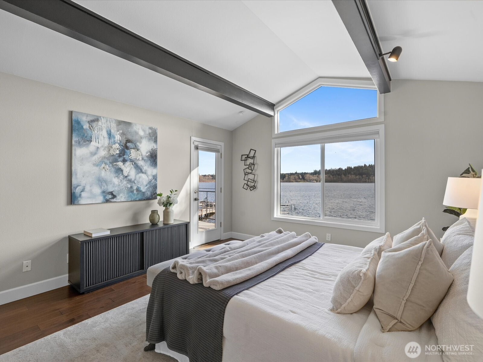 17412 Northeast 40th Place, Unit A6 Redmond, WA 98052 - Photo 19 of 40 a bedroom with a bed and glass window
