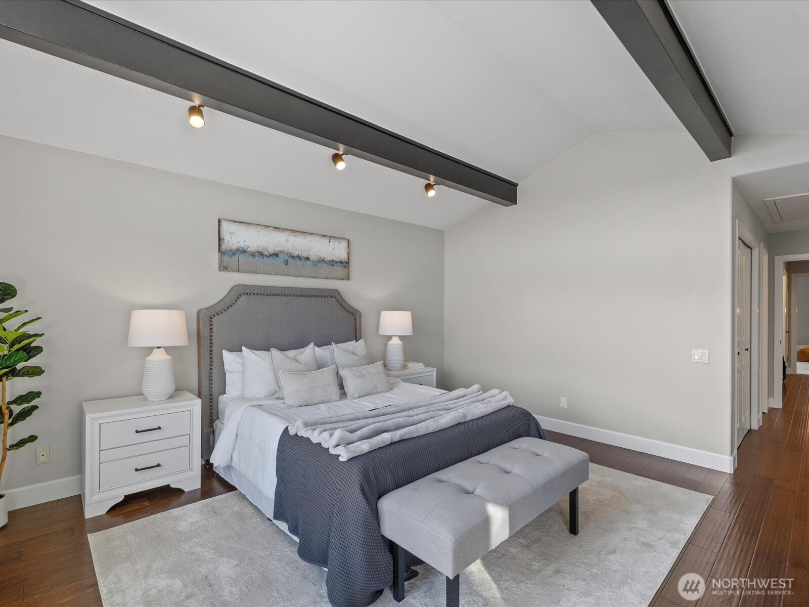 17412 Northeast 40th Place, Unit A6 Redmond, WA 98052 - Photo 20 of 40 a bedroom with a bed and a chair