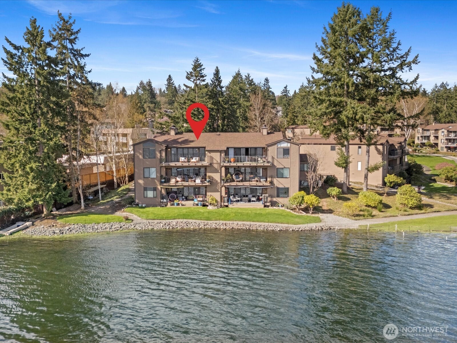 17412 Northeast 40th Place, Unit A6 Redmond, WA 98052 - Photo 2 of 40 a view of a lake with houses