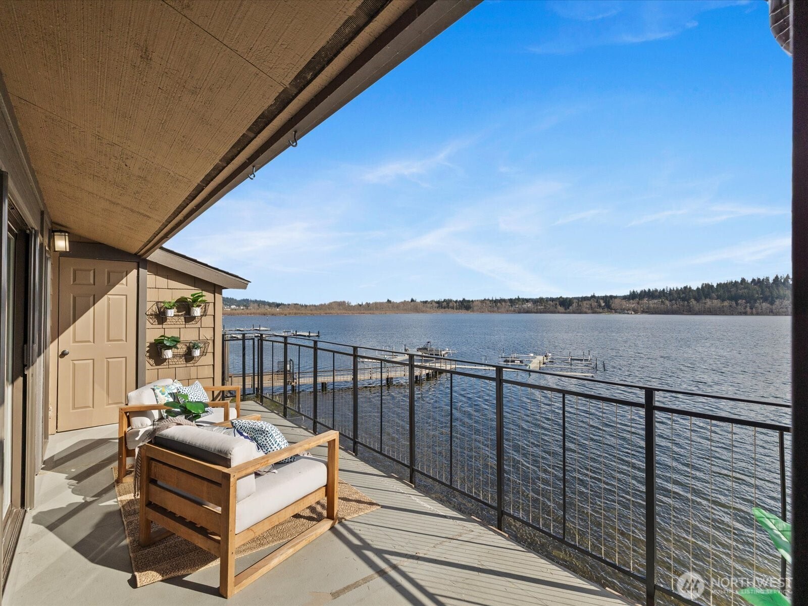 17412 Northeast 40th Place, Unit A6 Redmond, WA 98052 - Photo 21 of 40 a balcony with wooden floor