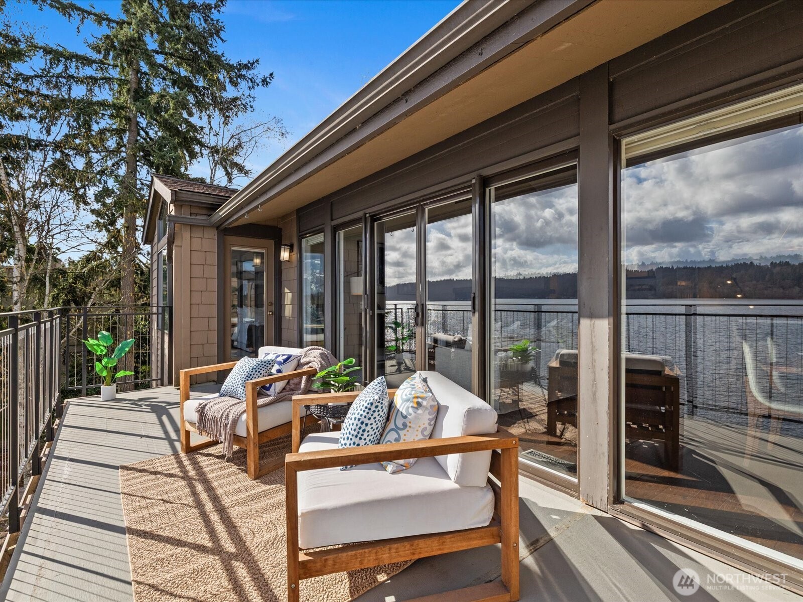 17412 Northeast 40th Place, Unit A6 Redmond, WA 98052 - Photo 22 of 40 a outdoor space with patio the couches and a potted plant on a table