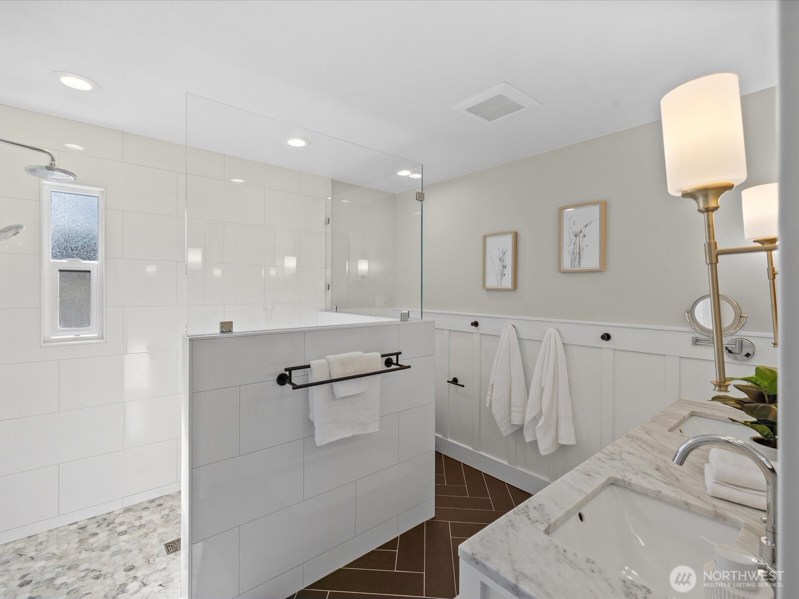17412 Northeast 40th Place, Unit A6 Redmond, WA 98052 - Photo 24 of 40 a bathroom with a sink and a mirror