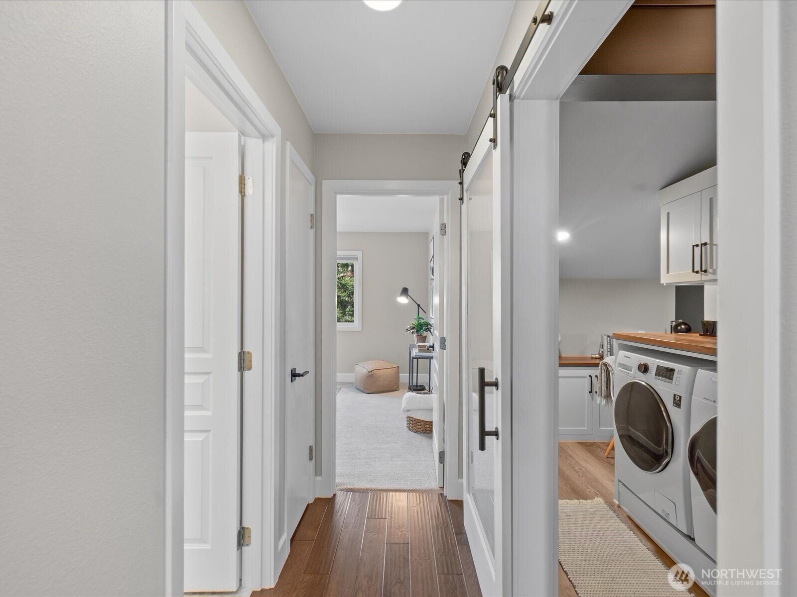 17412 Northeast 40th Place, Unit A6 Redmond, WA 98052 - Photo 27 of 40 a view of a hallway with a washer and dryer