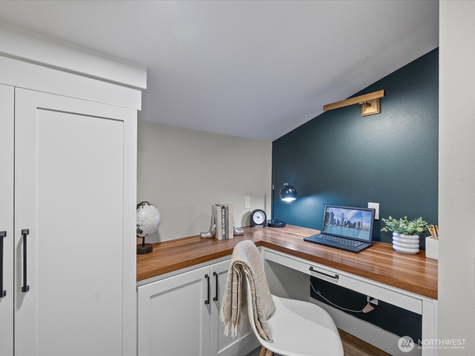 17412 Northeast 40th Place, Unit A6 Redmond, WA 98052 - Photo 28 of 40 a room with a table chairs and wooden floor