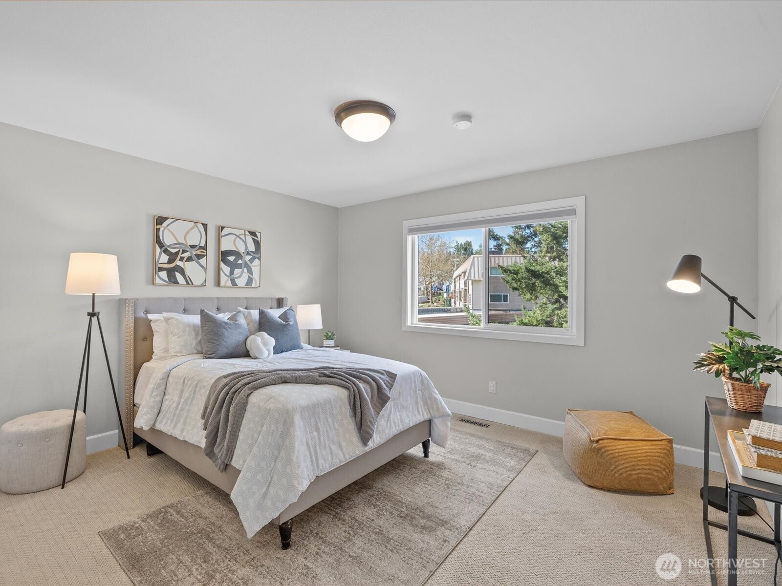 17412 Northeast 40th Place, Unit A6 Redmond, WA 98052 - Photo 29 of 40 a bedroom with a bed and a window