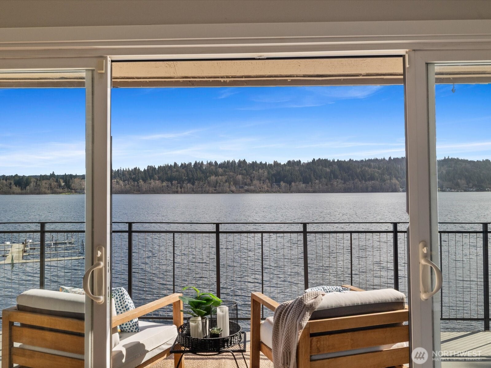 17412 Northeast 40th Place, Unit A6 Redmond, WA 98052 - Photo 31 of 40 a view of a balcony with couches and wooden floor