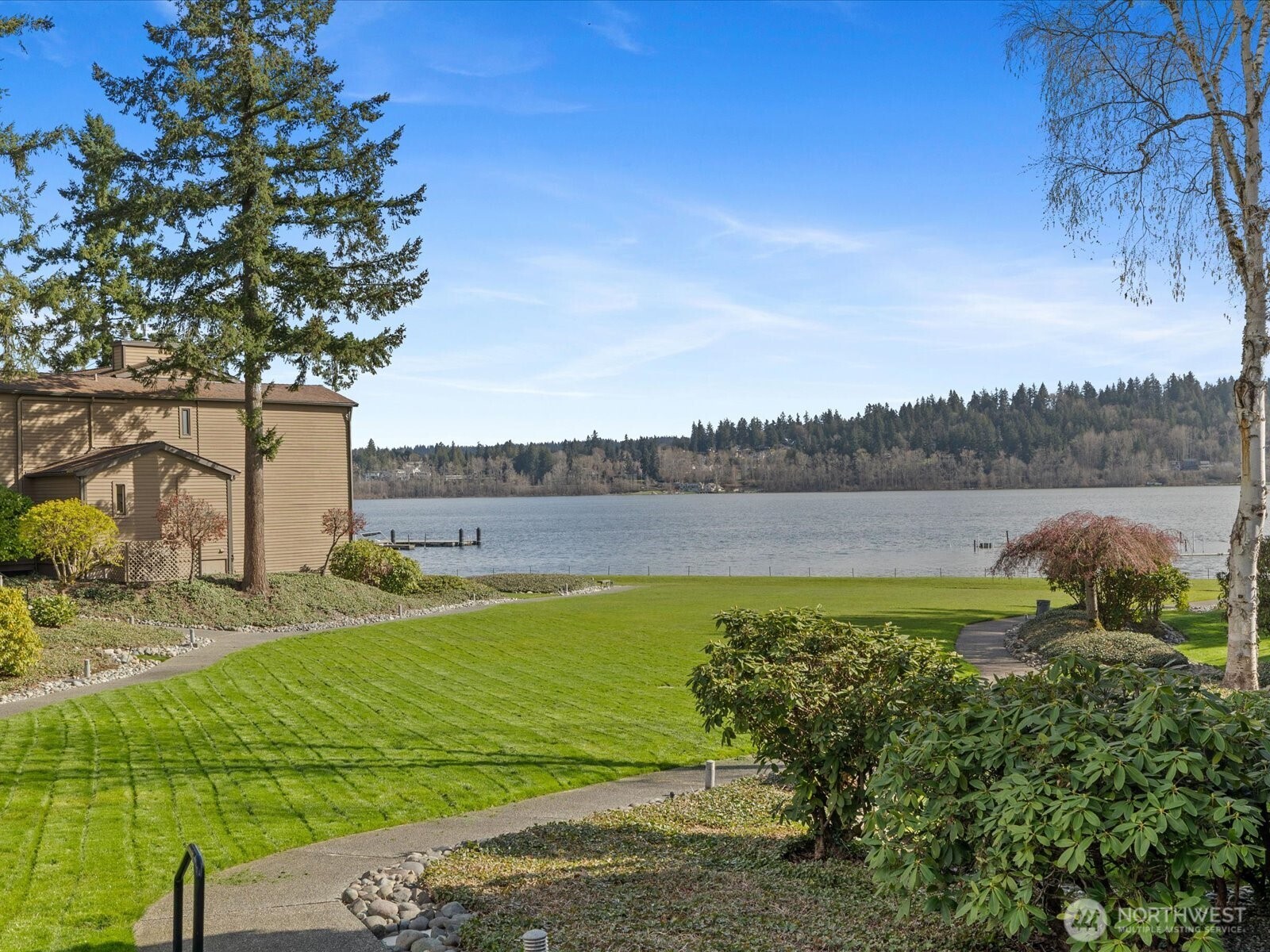 17412 Northeast 40th Place, Unit A6 Redmond, WA 98052 - Photo 33 of 40 a view of a lake with a big yard