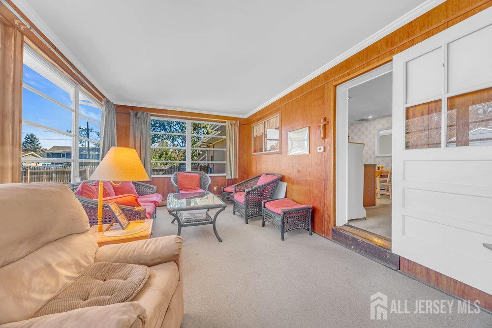 531 Chestnut Street Middlesex, NJ 08846 - Photo 18 of 42 a living room with furniture and a window