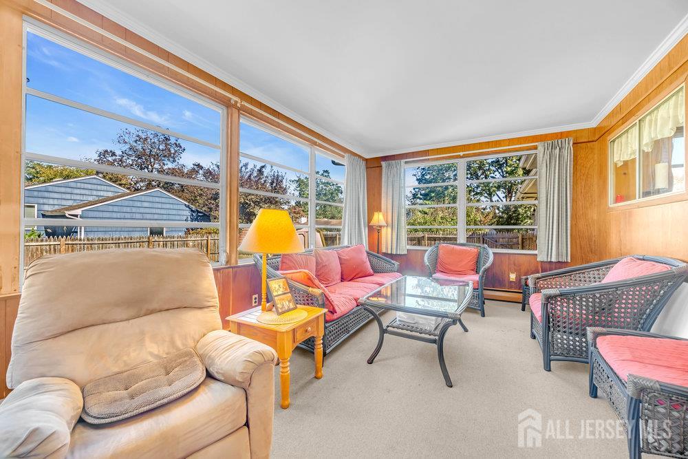531 Chestnut Street Middlesex, NJ 08846 - Photo 19 of 42 a living room with furniture and a window