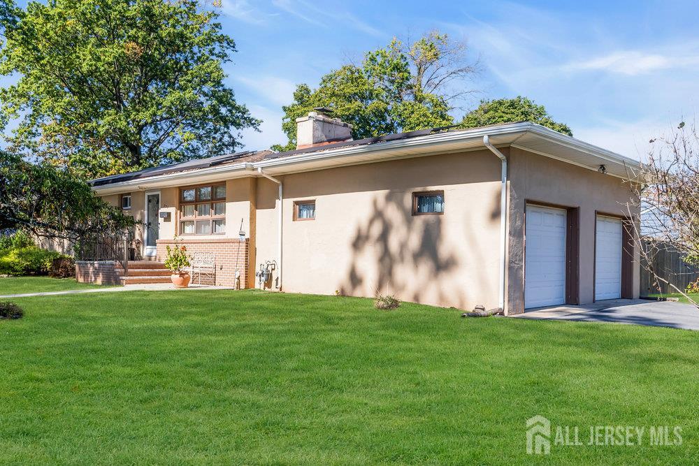 531 Chestnut Street Middlesex, NJ 08846 - Photo 2 of 42 a view of a yard with a house