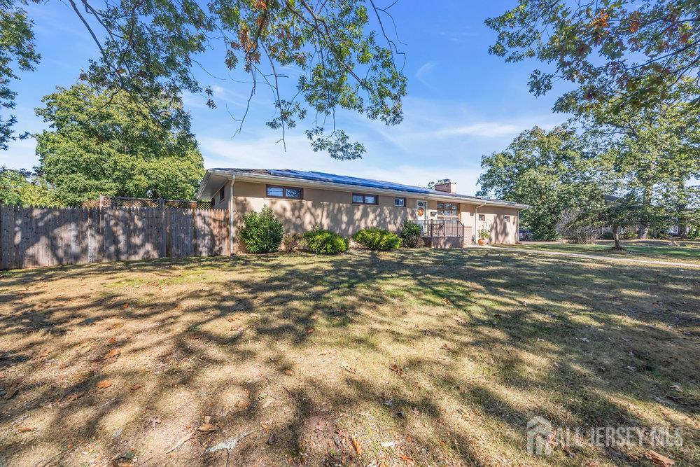 531 Chestnut Street Middlesex, NJ 08846 - Photo 32 of 42 a front view of a house with a yard