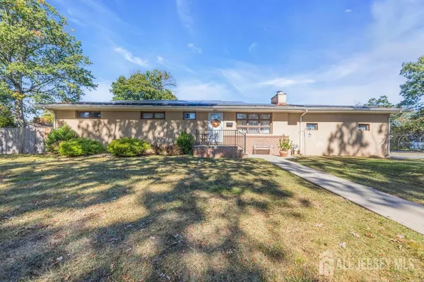 a view of swimming pool with a yard