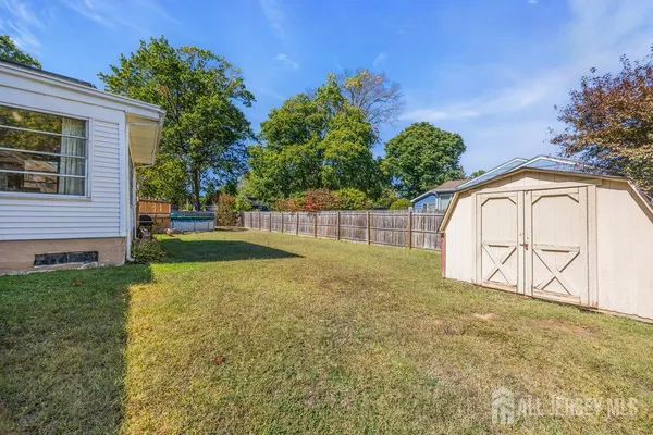 a view of back yard of the house