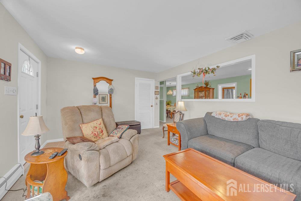 531 Chestnut Street Middlesex, NJ 08846 - Photo 10 of 42 a living room with furniture and a couch