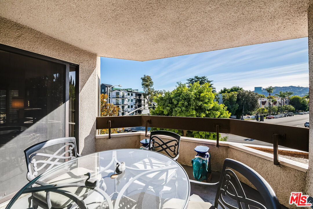 10409 Riverside Drive, Unit 203 Toluca Lake, CA 91602 - Photo 17 of 34 a view of balcony and patio
