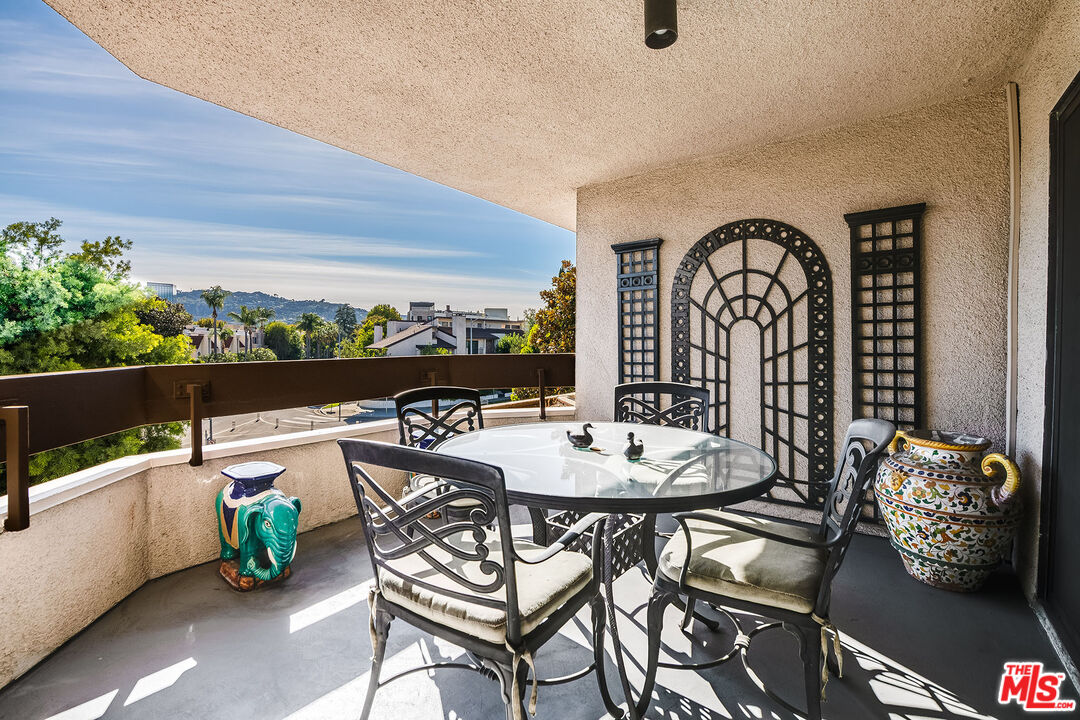 10409 Riverside Drive, Unit 203 Toluca Lake, CA 91602 - Photo 18 of 34 a view of an outdoor space with seating area