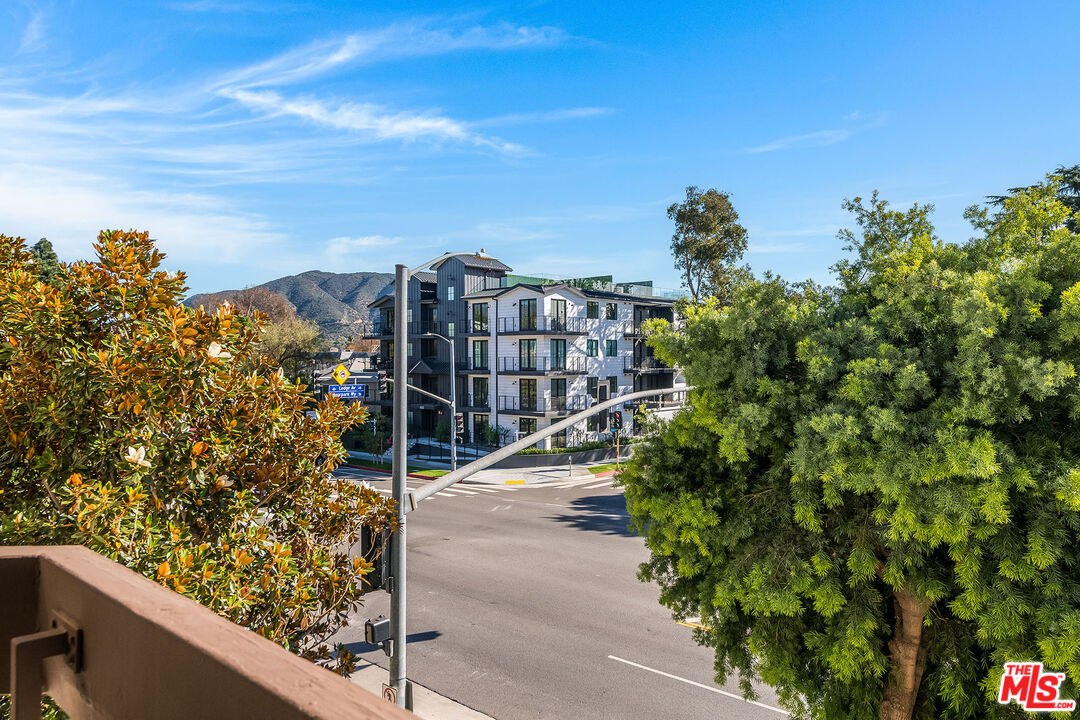 10409 Riverside Drive, Unit 203 Toluca Lake, CA 91602 - Photo 20 of 34 a view of a city from a balcony