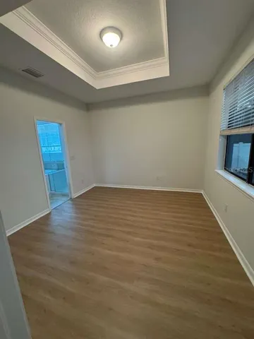 a bathroom with a tub and shower