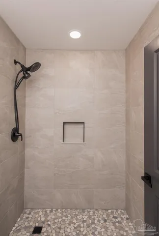 a bathroom with a sink toilet and mirror