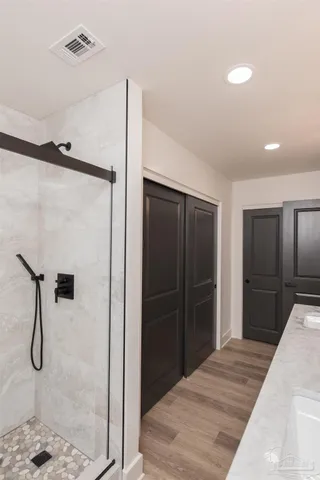 a bathroom with a sink and mirror