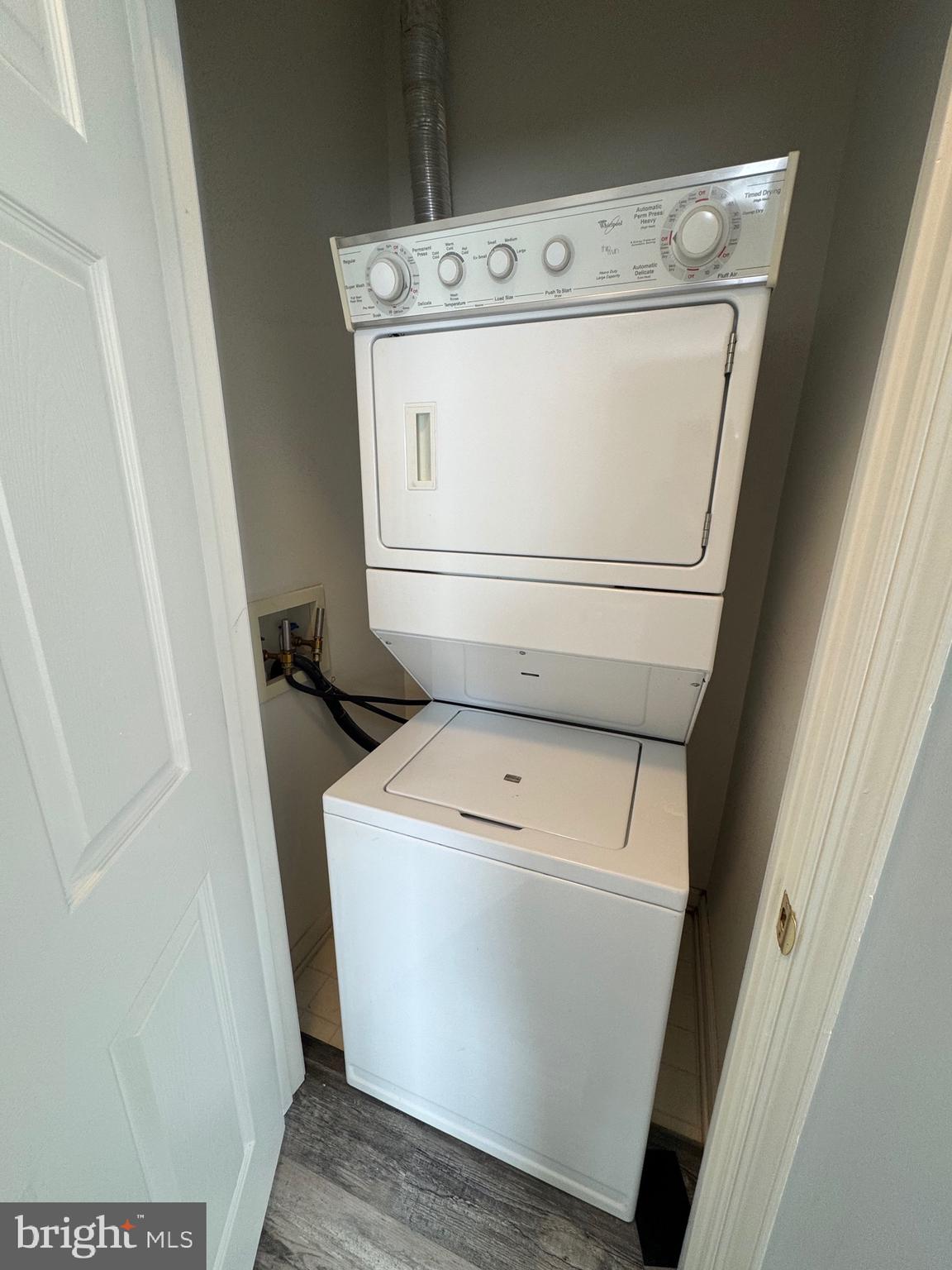 1716 Lake Shore Crest Drive, Unit 32 Reston, VA 20190 - Photo 25 of 40 a utility room with dryer and washer