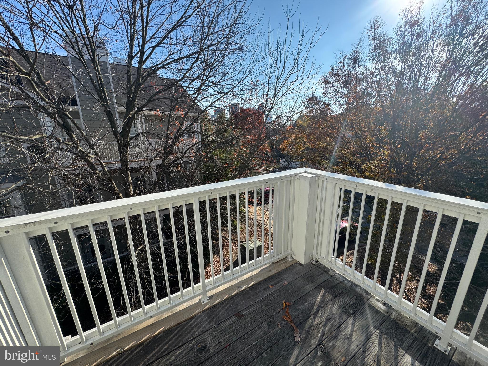 1716 Lake Shore Crest Drive, Unit 32 Reston, VA 20190 - Photo 27 of 40 a view of balcony and wooden deck