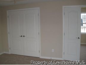 185 Rockingham Street Spring Lake, NC 28390 - Photo 8 of 12 a view of a closet