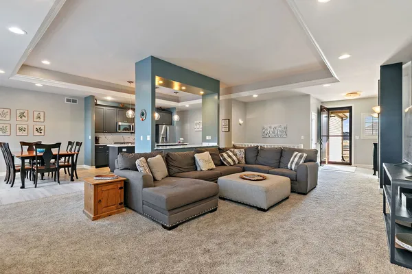 a living room with furniture and a table