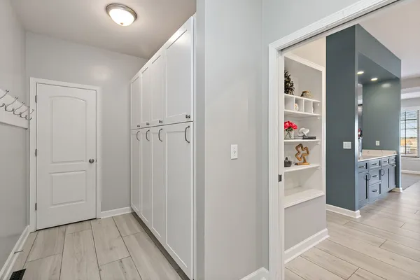 a kitchen that has a sink and a stove in it