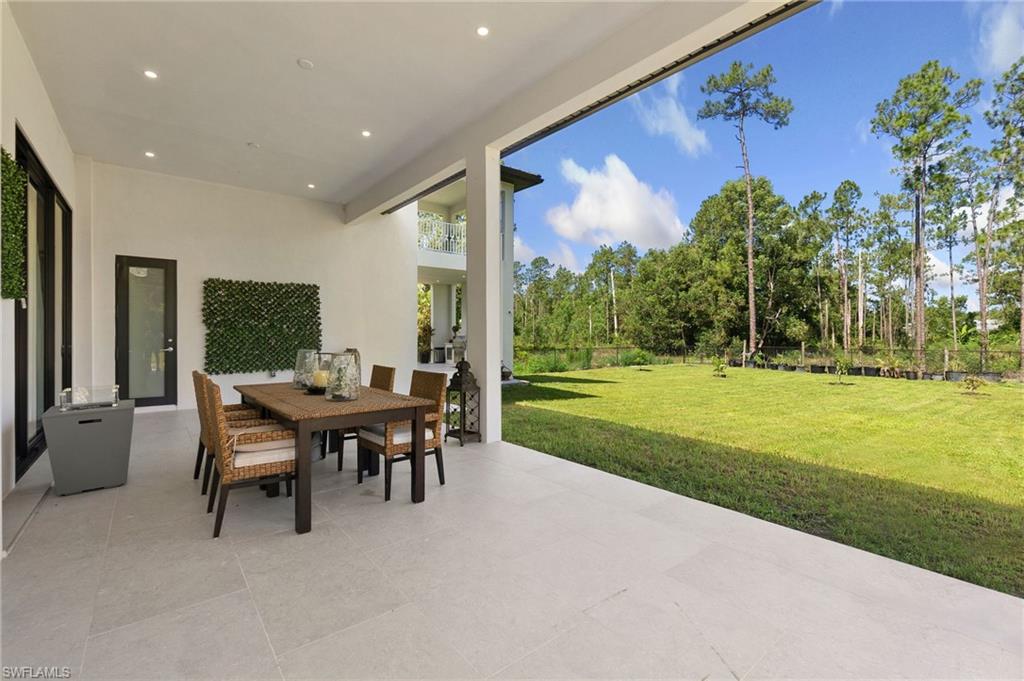 2227 21st Street Southwest Naples, FL 34117 - Photo 43 of 50 a outdoor space with furniture