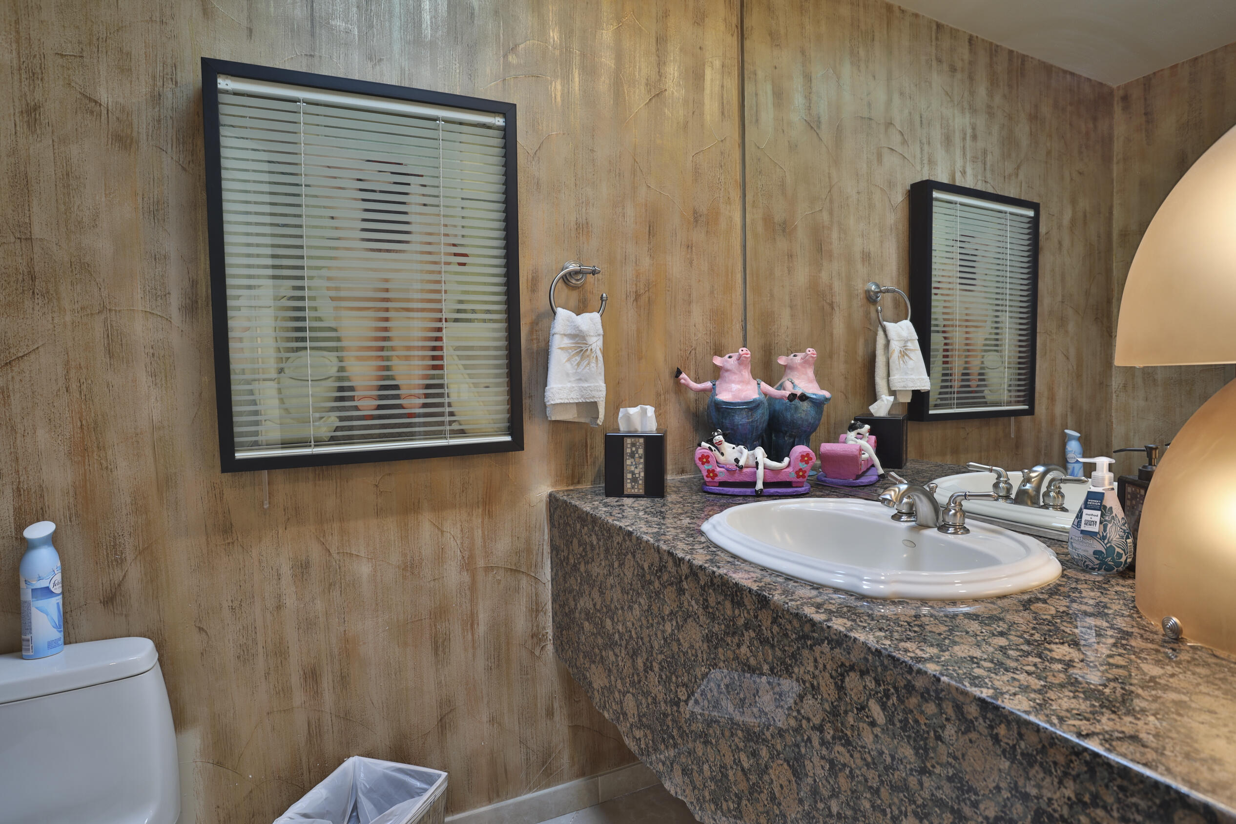 45735 Pawnee Road Indian Wells, CA 92210 - Photo 13 of 74 a bathroom with a sink a toilet and a mirror