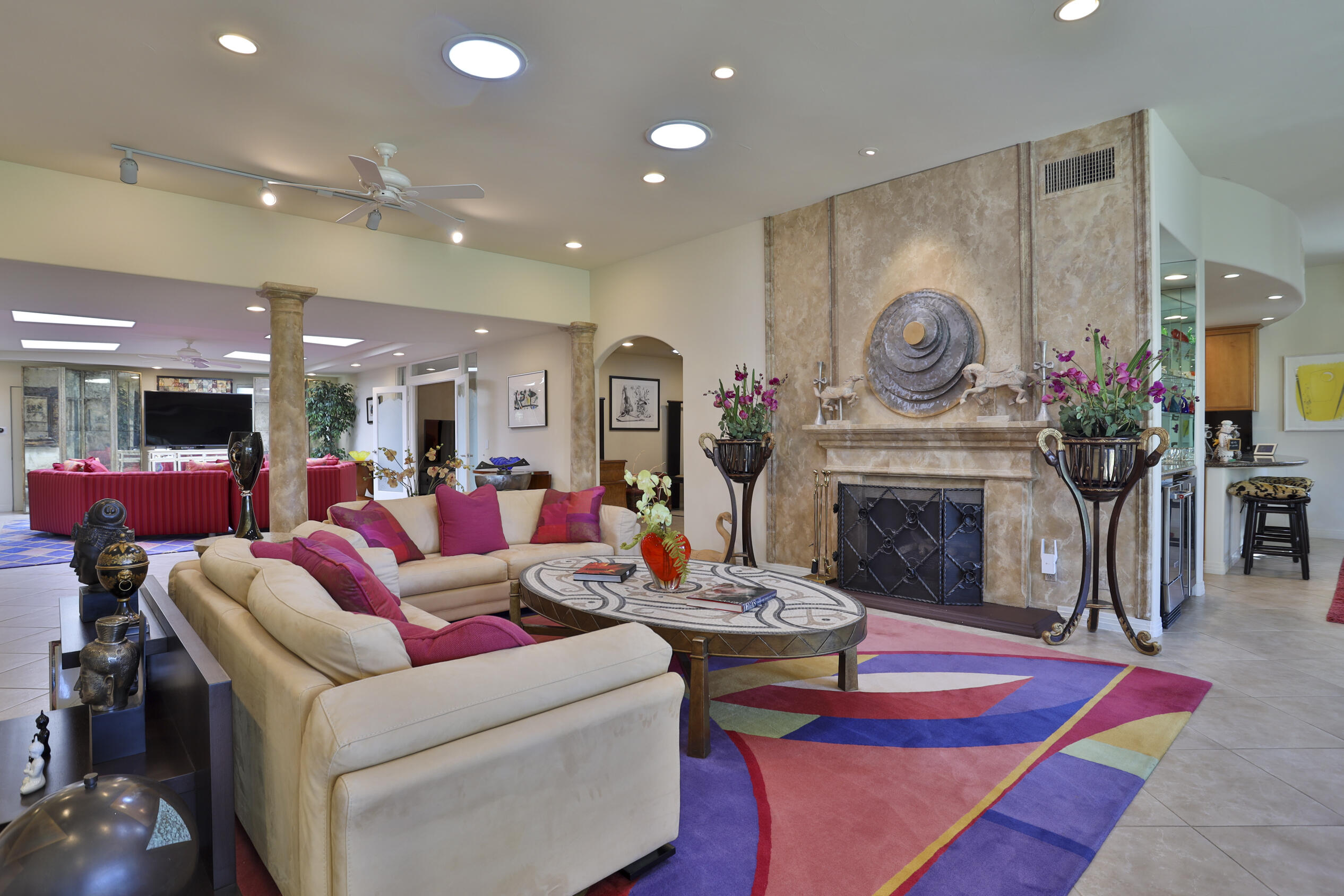 45735 Pawnee Road Indian Wells, CA 92210 - Photo 16 of 74 a living room with furniture and a fireplace