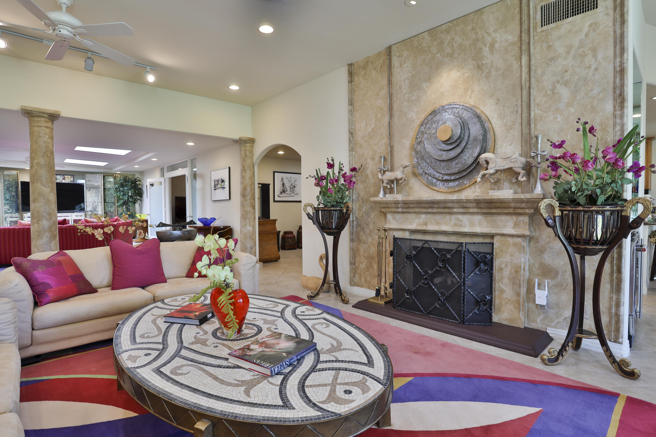 45735 Pawnee Road Indian Wells, CA 92210 - Photo 18 of 74 a living room with furniture and a fireplace