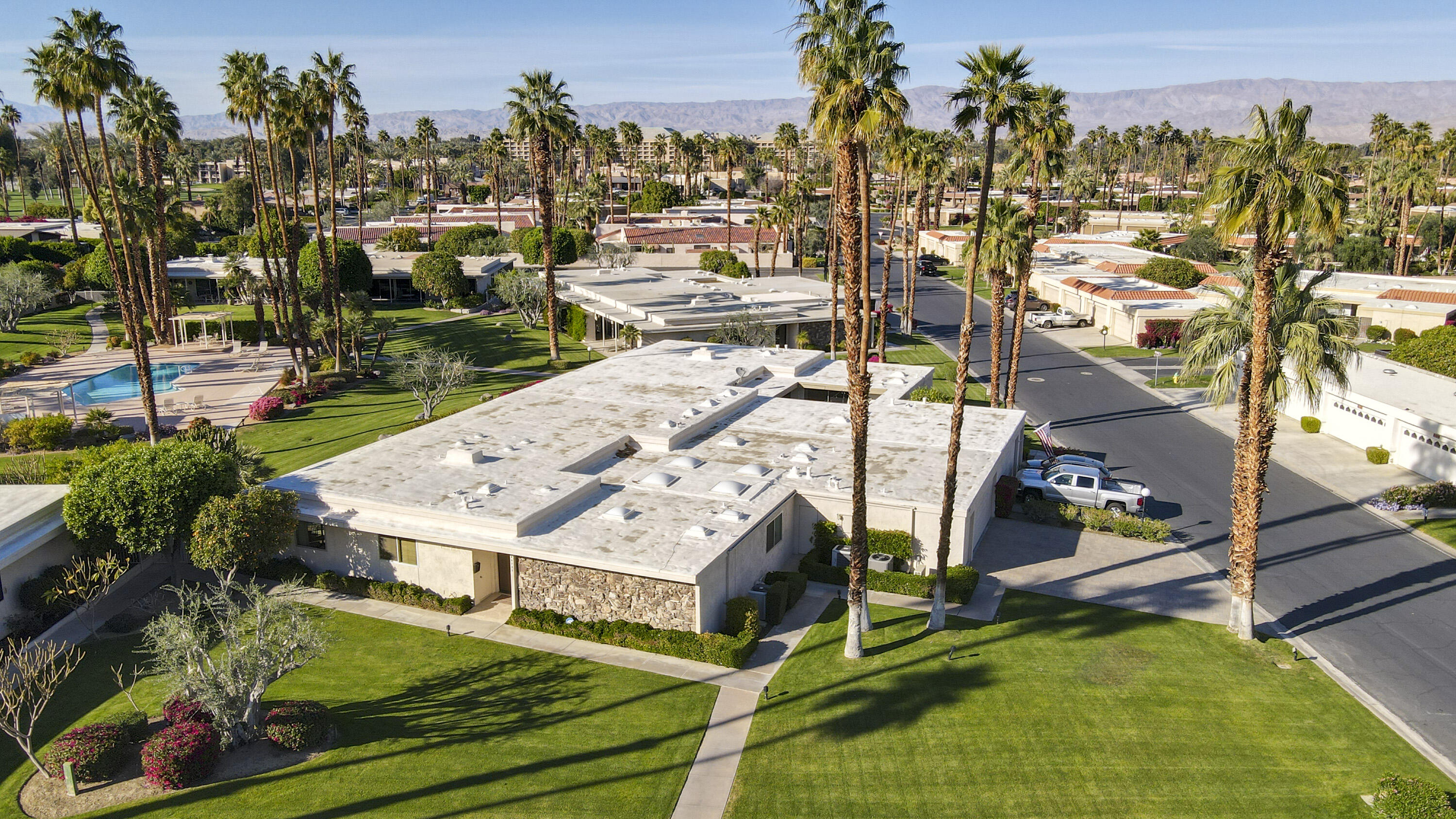 45735 Pawnee Road Indian Wells, CA 92210 - Photo 2 of 74 an aerial view of residential houses with outdoor space