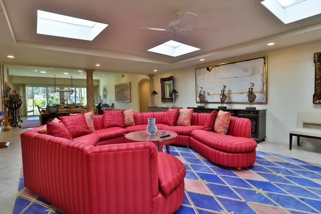 a bedroom with a bed and a table