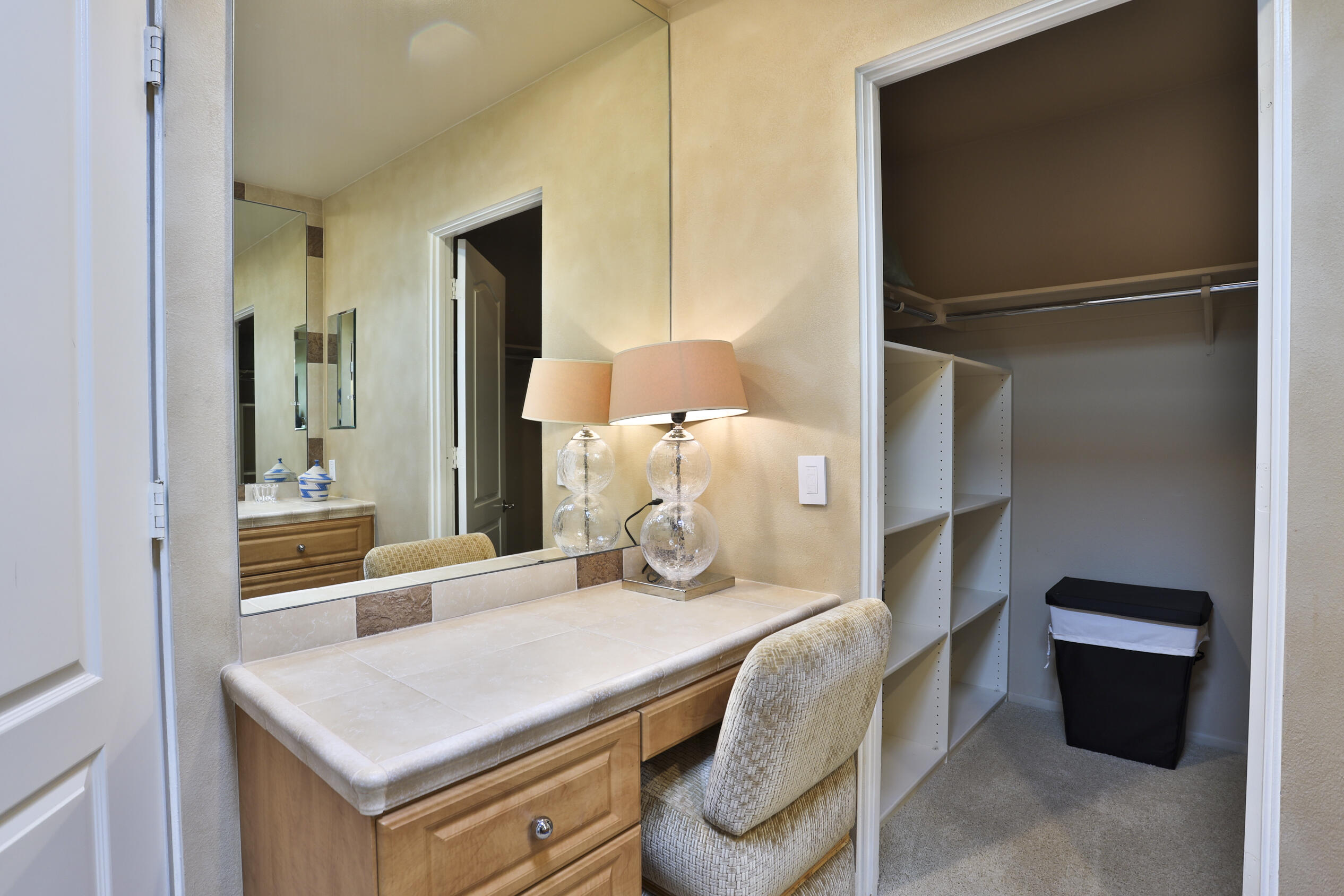 45735 Pawnee Road Indian Wells, CA 92210 - Photo 55 of 74 a bedroom with a bed and a table