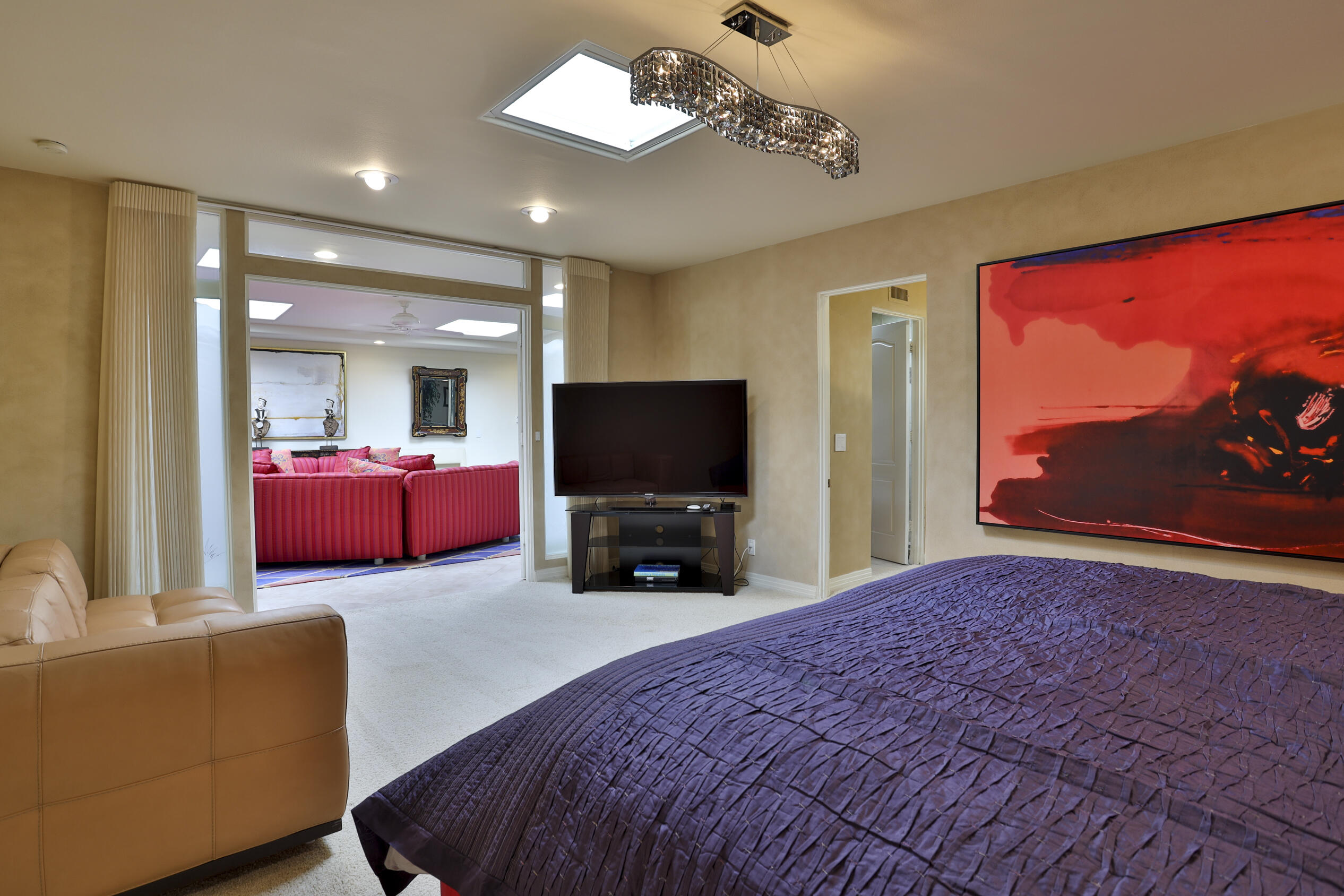 45735 Pawnee Road Indian Wells, CA 92210 - Photo 61 of 74 a living room with furniture and a flat screen tv