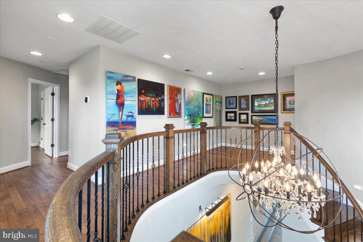 410 Riverside Drive Prince Frederick, MD 20678 - Photo 28 of 82 A motorized winch is attached to the chandelier fo