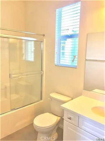 a bathroom with a sink a toilet and a bathtub